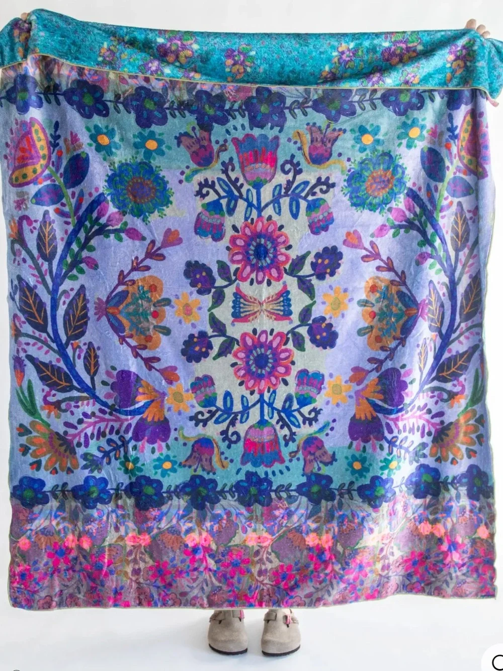 Natural Life features a vibrant Border Folk Garden floral pattern